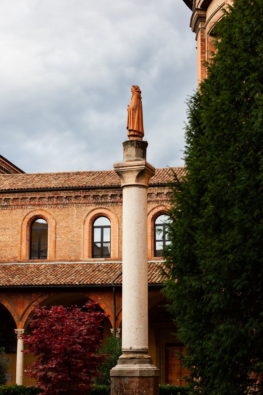 Pedestal Statue of St. Dominic in Cloister, Bologna, Italy