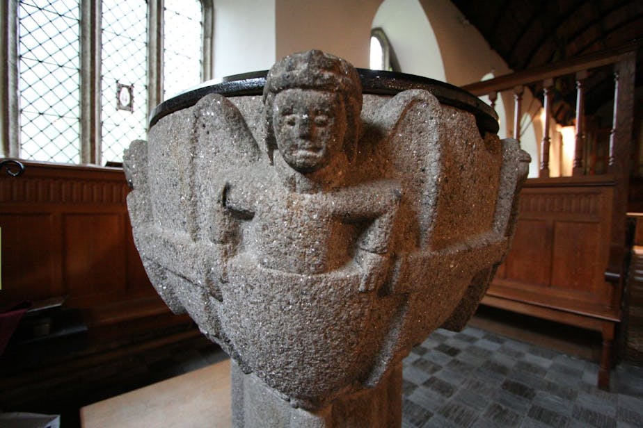 angel, 15C granite font